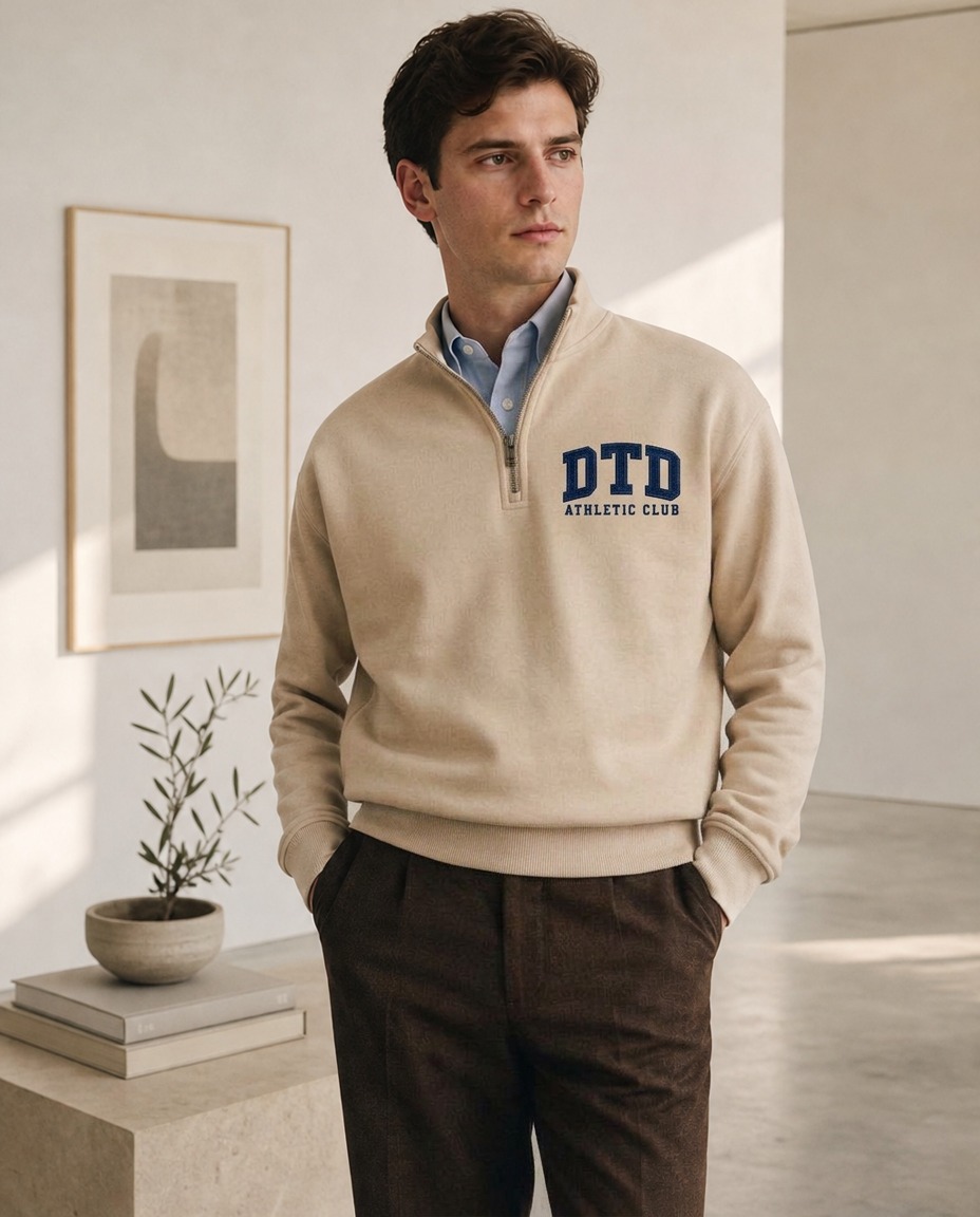 Man in the Athletic Club half zip